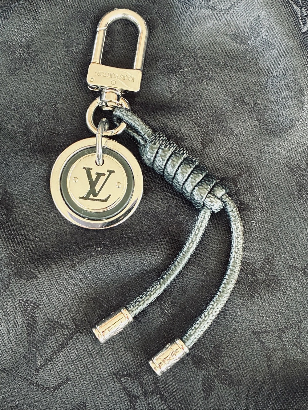 Louis Vuitton Silver LV Circle Medallion & Knotted Graphite Rope Key Holder EUC